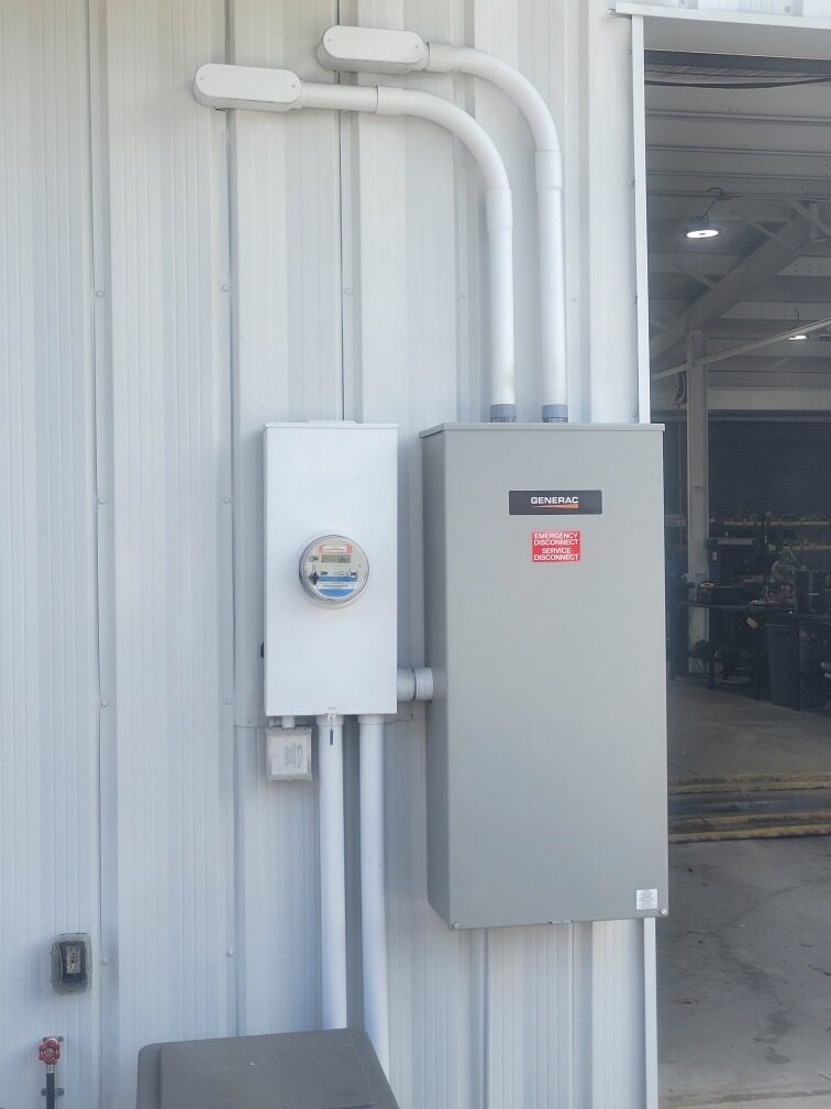 Generac automatic transfer switch and service disconnect installed by Dan House Electric