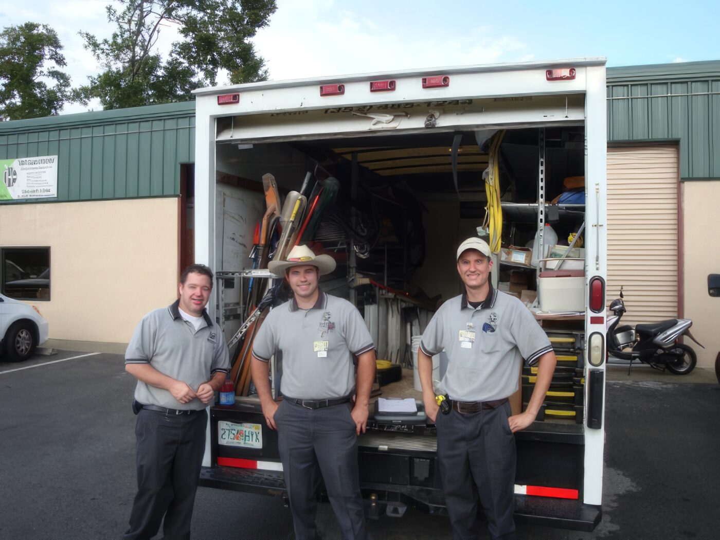 Dan House Electric electricians by a fully stocked service truck