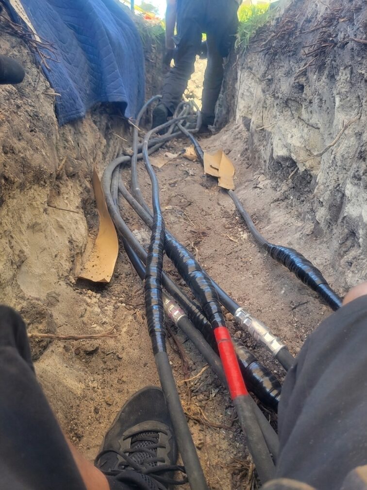 Dan House Electric underground feeder cables for an electrical service upgrade